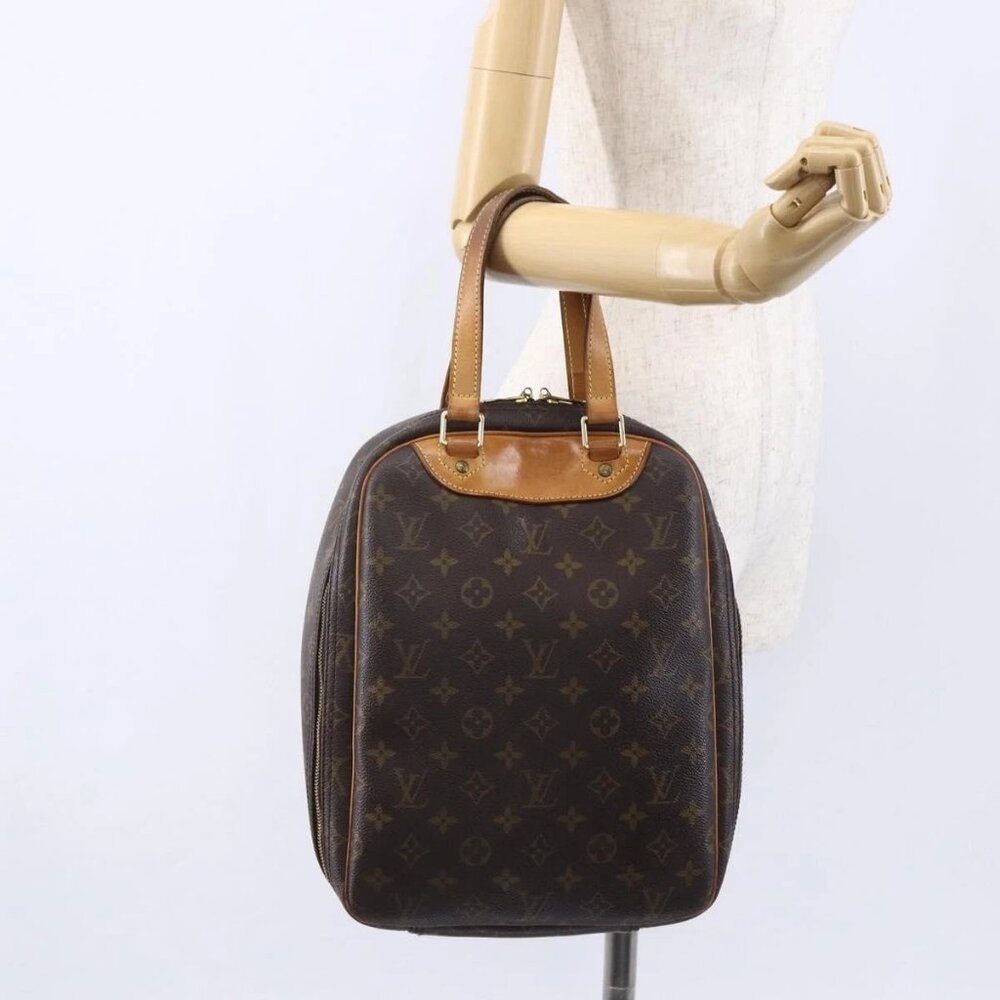 LOUIS VUITTON Monogram Excursion Hand Bag